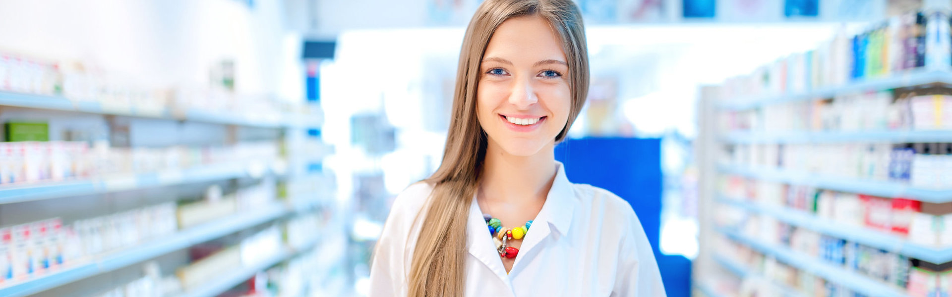 woman standing in pharmacy drugstore
