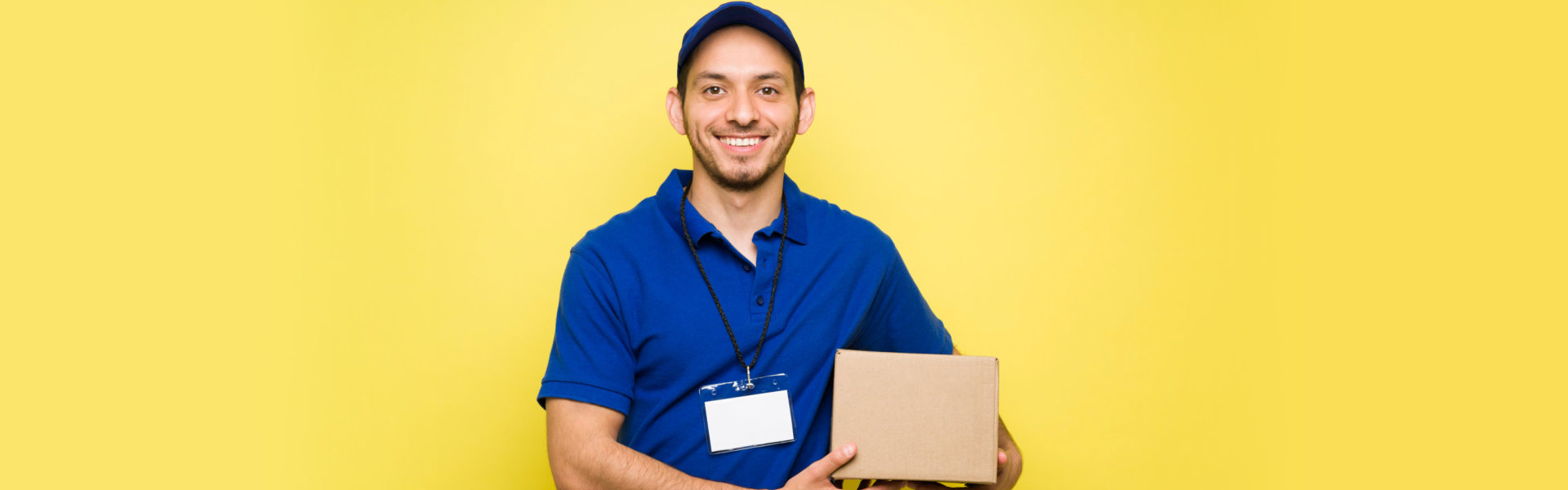 man holding a package under his arm